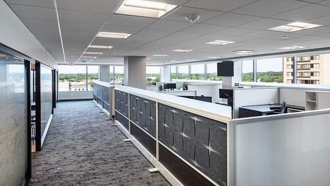 Tattoo Screens in an open office space; flexible and efficient screens in a shared workspace at United Fire Group